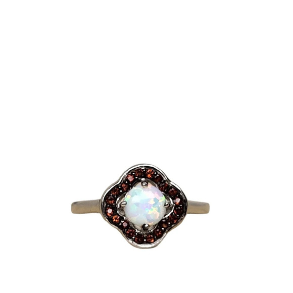 Sterling Silver Garnet Created White Opal Flower Ring - Picture 3 of 16
